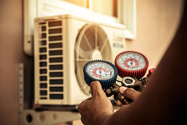 Professional Air Conditioning Service technician working in New London, TX